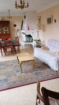 a living room with a couch and a table at Aix en Provence in Aix-en-Provence