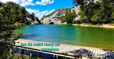 a dock on a lake with a sign on it at Maison de village rénovée au pied des alpilles in Mollégès