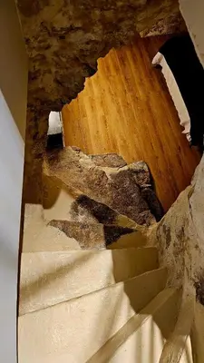 a view of a staircase in a building with a floor at Suite dans le centre historique in Aix-en-Provence
