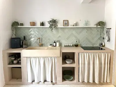 a kitchen with a sink and a counter with curtains at Historic Centre Location Charming House with Style in Carpentras