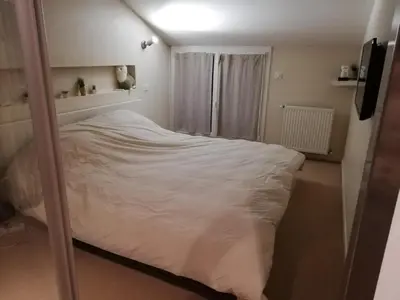 a bedroom with a large white bed in it at country house in Provence in Pierrevert