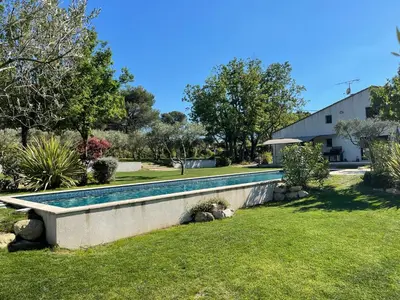 a swimming pool in the yard of a house at Maison Cireline en Provence, Rognes in Rognes