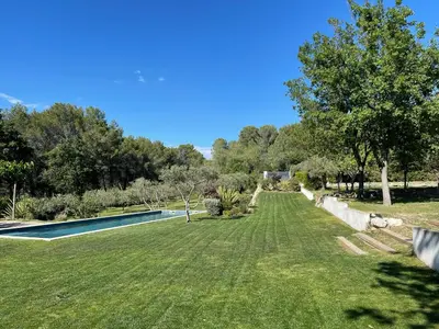 a large yard with a swimming pool and trees at Maison Cireline en Provence, Rognes in Rognes