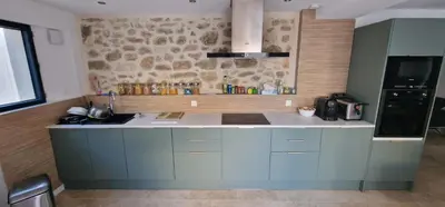 a kitchen with a sink and a counter top at Quiet, discreet places in Vernègues