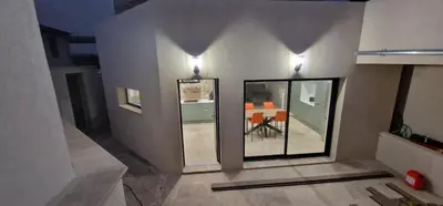 a room with two mirrors on the wall with a table at Quiet, discreet places in Vernègues