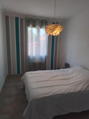 a bedroom with a bed and a window at Ventoux beautiful quiet house in Saint-Christol