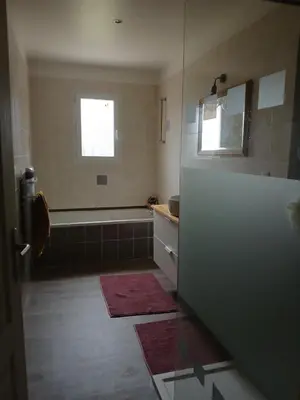 a bathroom with a tub and a toilet and a sink at Ventoux beautiful quiet house in Saint-Christol