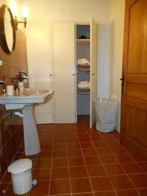 a bathroom with a sink and a toilet at Villa Provençale avec piscine in Pernes-les-Fontaines