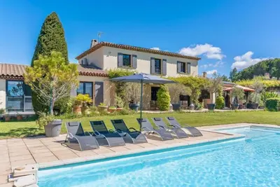 a villa with a swimming pool and a house at Villa Aix-en-Provence Pool and absolute calm in Aix-en-Provence