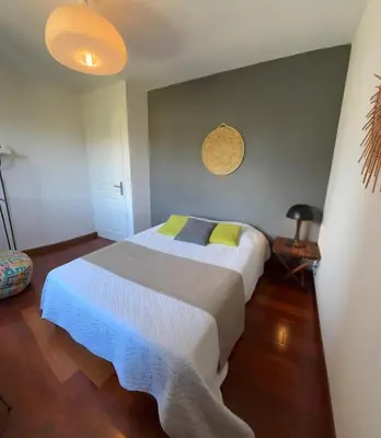a bedroom with a large white bed in a room at Villa Aix-en-Provence Pool and absolute calm in Aix-en-Provence
