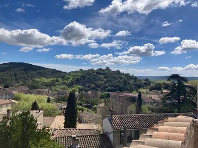 a view of a town from the roofs of houses at Maison de famille en Provence in Rognes