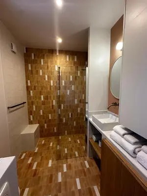 a bathroom with a shower and a sink at La Réserve Villa in Aix-en-Provence