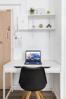 a white desk with a laptop computer on it at Le Cézanne - Studio Hypercentre - Wifi - Train station in Aix-en-Provence