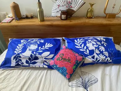 two pillows sitting on top of a bed at Peaceful Family Retreat In Aix-En-Provence in Puyricard