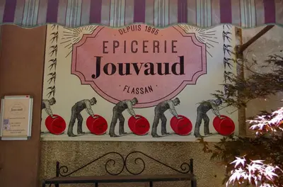 a sign for an event with people chopping tomatoes at La maison de Flassan chic et sport in Flassan