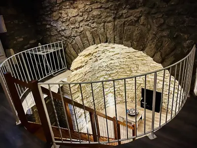 an overhead view of a stone oven in a building at Charme unique sous les remparts in Châteauneuf-de-Gadagne