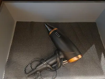 a hairdryer sitting on top of a box at Maison privée billard spa dans village du Luberon in Cabrières-dʼAigues