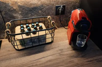 a scooter with a basket full of wine bottles at Maison privée billard spa dans village du Luberon in Cabrières-dʼAigues