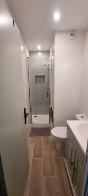 a bathroom with a shower and a toilet and a sink at Appartement in Aix-en-Provence