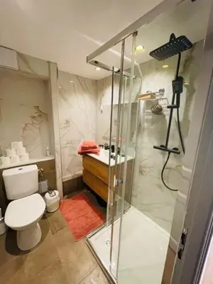 a bathroom with a shower and a toilet and a sink at City break in old center Aix! in Aix-en-Provence