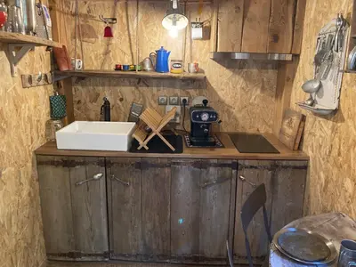 a kitchen with a sink and a counter top at Le Cabanon d 'Aix in Aix-en-Provence