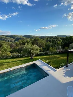 a swimming pool with a view from a house at Villa Moderne 5 chambres - Aix-En-Provence - piscine in Le Tholonet