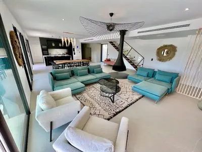 an aerial view of a living room with blue furniture at Villa Moderne 5 chambres - Aix-En-Provence - piscine in Le Tholonet