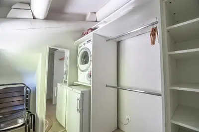 a laundry room with a washer and dryer at Chez Marthe - Maison de village - Ménerbes centre in Ménerbes