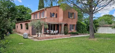 an old brick house with a table in a yard at Villa Rosa peaceful haven 10m from Aix 11 guests in Aix-en-Provence