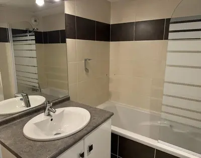 a bathroom with a sink and a shower and a tub at résidence avec piscines à proximité de Gordes in Gordes