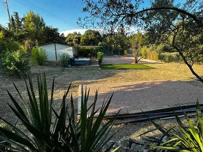a view of a yard with a house at L'Essentiel Room in Velaux