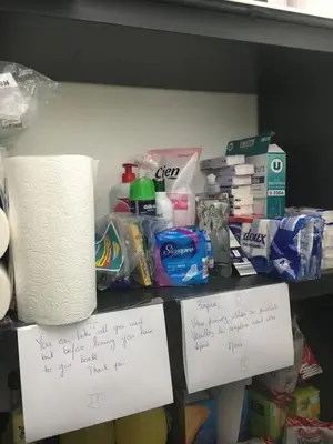 a shelf with toilet paper and other items on it at La parenthèse sur la sorgue in LʼIsle-sur-la-Sorgue