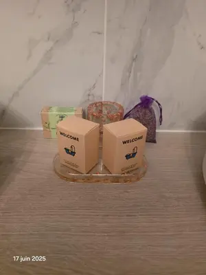 a tray with three boxes on top of a table at La Pineda de Provence in Aix-en-Provence