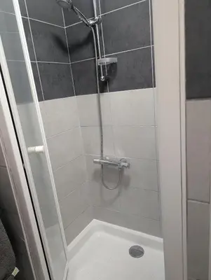 a shower with a glass door in a bathroom at LE CHESTER - Maison de charme en Provence avec piscine près de L'Isle-sur-la-Sorgue in Velleron