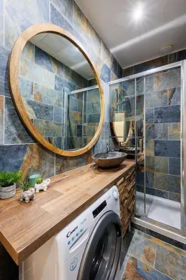 a washer and dryer in a bathroom with a mirror at Bali Dream I Hyper Centre Fountain Moussue in Salon-de-Provence