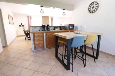 a kitchen with a table and some chairs at Villa overlooking the Alpilles Saint Remy de Provence LS1-454 in Saint-Rémy-de-Provence