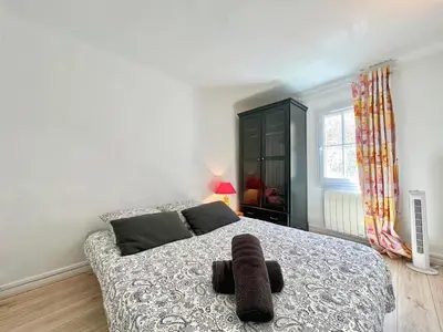 a bedroom with a bed and a window at Miraluna - Village médiéval, calme, insolite, 6 personnes in Miramas