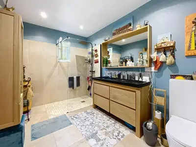 a bathroom with a shower and a sink at Casa du Luberon in Maubec