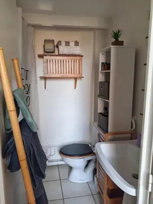 a bathroom with a toilet and a sink at Charmant studio centre historique Aix in Aix-en-Provence