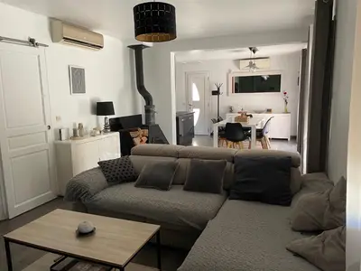 a living room with a couch and a table at Villa de caractères,piscine, vue sur le luberon,3 chambres in Cheval-Blanc