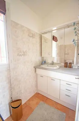a bathroom with a sink and a mirror at Magnifique villa avec piscine à 2 pas du centre d'Aix in Aix-en-Provence