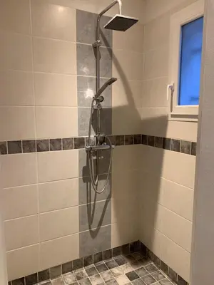 a shower stall in a bathroom with a window at Villa Serena - 3 chambres grand confort - 6 personnes in Carpentras