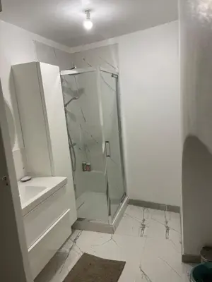 a bathroom with a shower and a sink at Plaisir de vacances in Aix-en-Provence