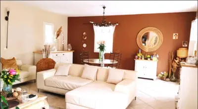a living room with a white couch and a table at Belle bastide provençale in Noves