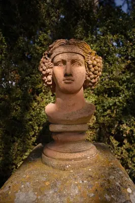 a statue of a bust of a woman on a rock at Havre de Paix en Provence in Aix-en-Provence