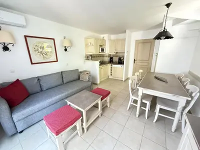 a living room with a couch and a table at Maison en Provence avec Piscine et Climatisation - FR-1-658-36 in Mallemort
