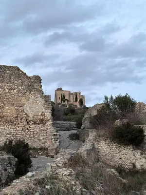 an old castle on top of a hill at Keur Bouyo - Provençal Luxury Retreat in Saint-Saturnin-les-Apt