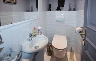a white bathroom with a toilet and a sink at Stunning Home In Morières-Lès-Avignon in Morières-lès-Avignon