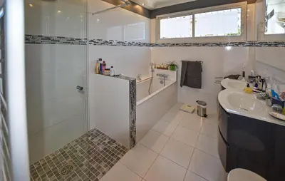 a white bathroom with a shower and a sink at Stunning Home In Morières-Lès-Avignon in Morières-lès-Avignon