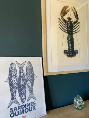 a picture of a lobster and a sign on a wall at La Petite Bastide en Provence in Noves